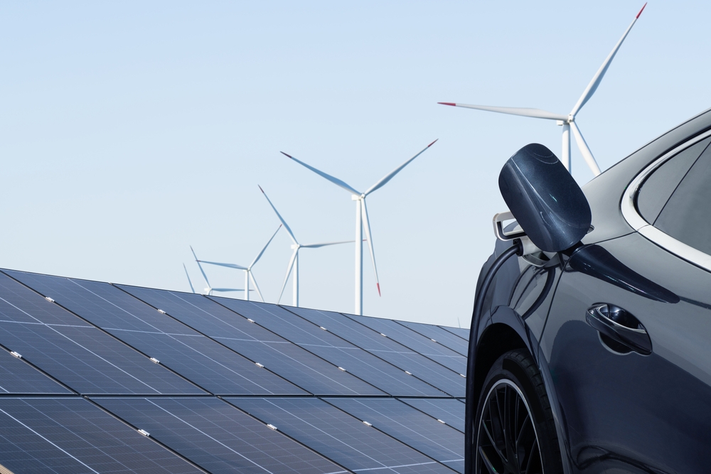 close,up,of,electric,car,with,a,connected,charging,cable